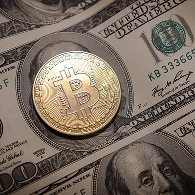 Bitcoin on Dollar Bills